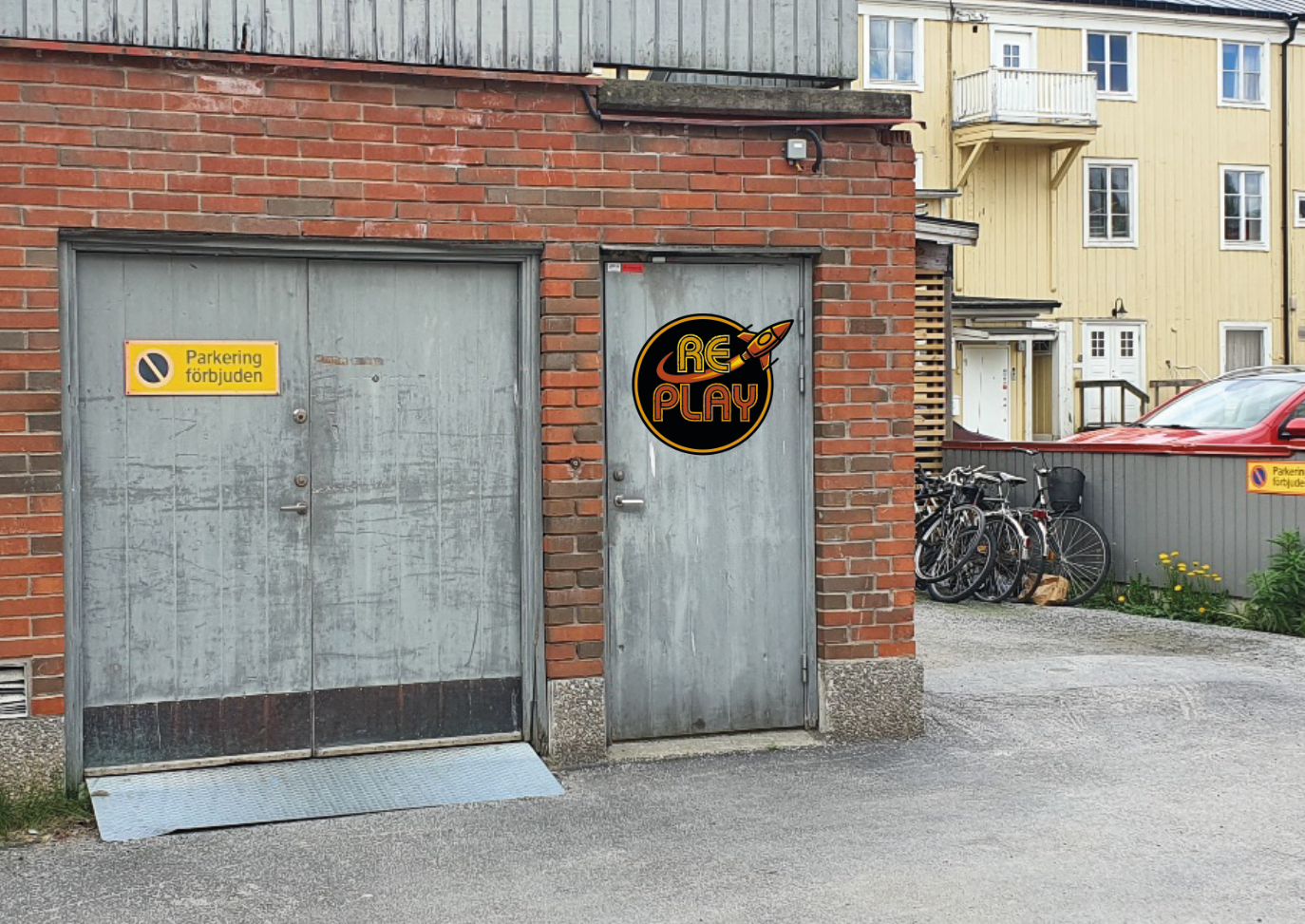 Ingång där skylten är